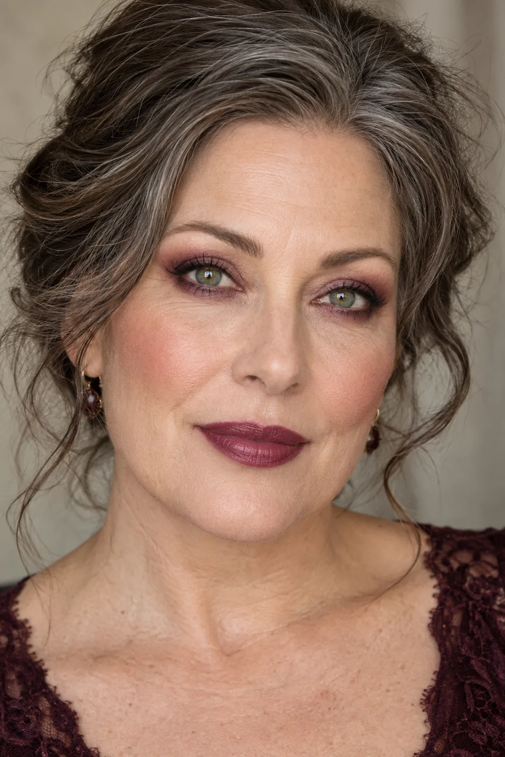 Fictional adult woman with green eyes, berry lower-lash smoke, fine liner, terracotta-rose blush, and satin plum lipstick.
