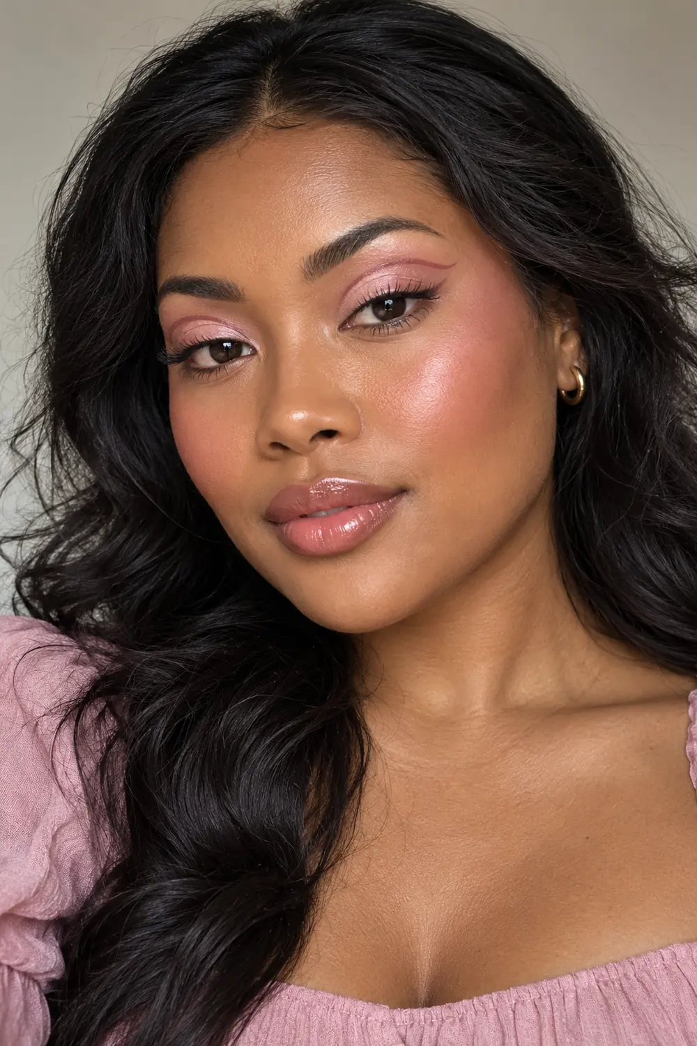 Adult woman with pale pink satin lids, a thin floating rose crease liner, high rosy blush, and nude-pink satin lipstick.
